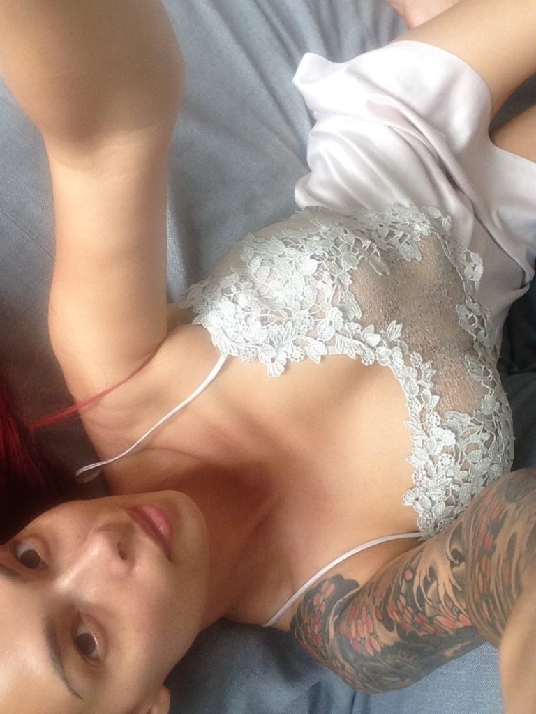Tera Patrick in negligee takes selfie