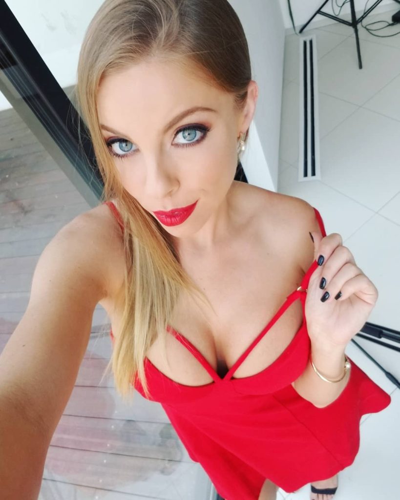 Britney Amber in red dress takes selfie