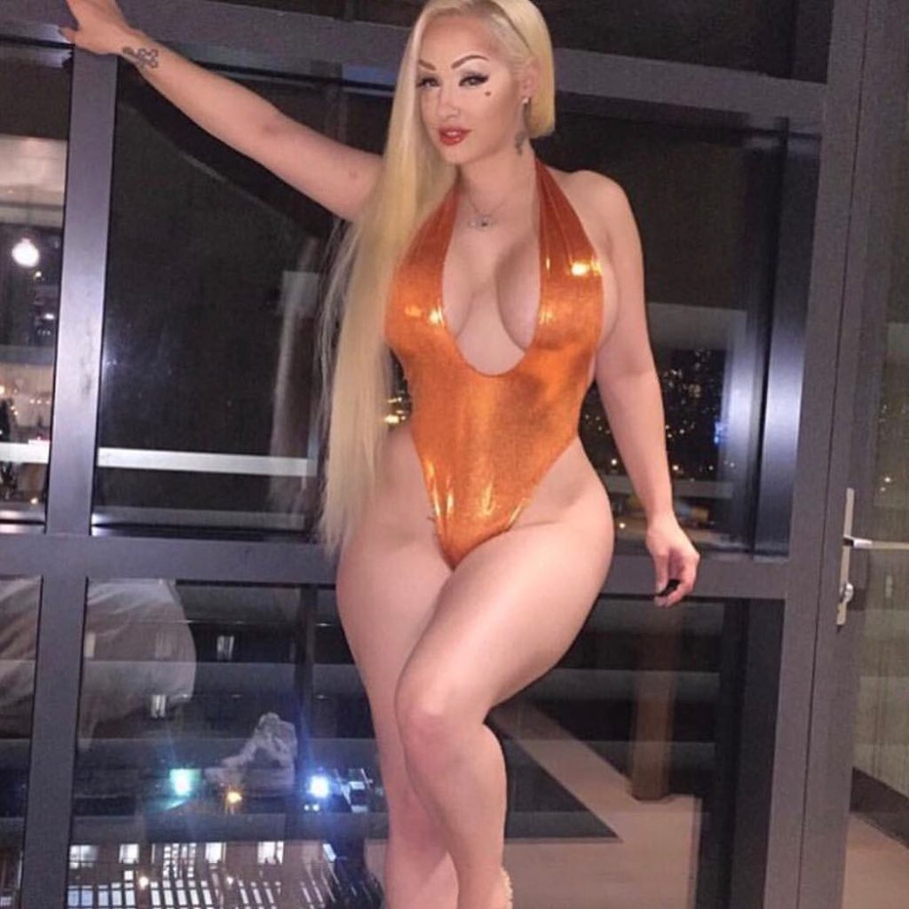 Instagram model Tanya Lieder in sexy orange swimsuit