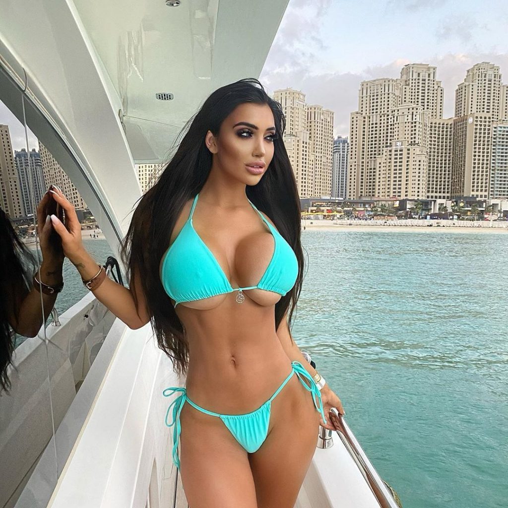 busty Camsoda webcam model Chloe Khan in bikini on boat